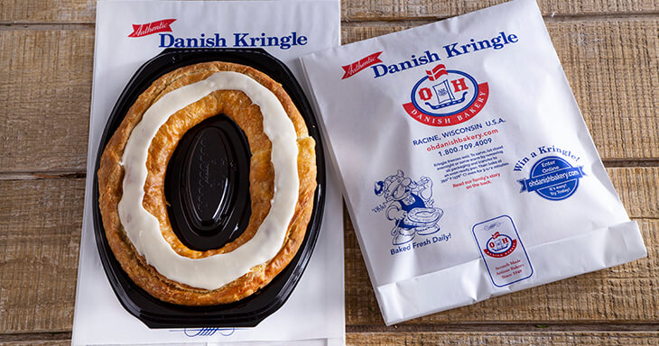 Treat yourself to the mouthwatering O&H Danish Bakery Kringle, thoughtfully packaged for safe travels and enjoyment.